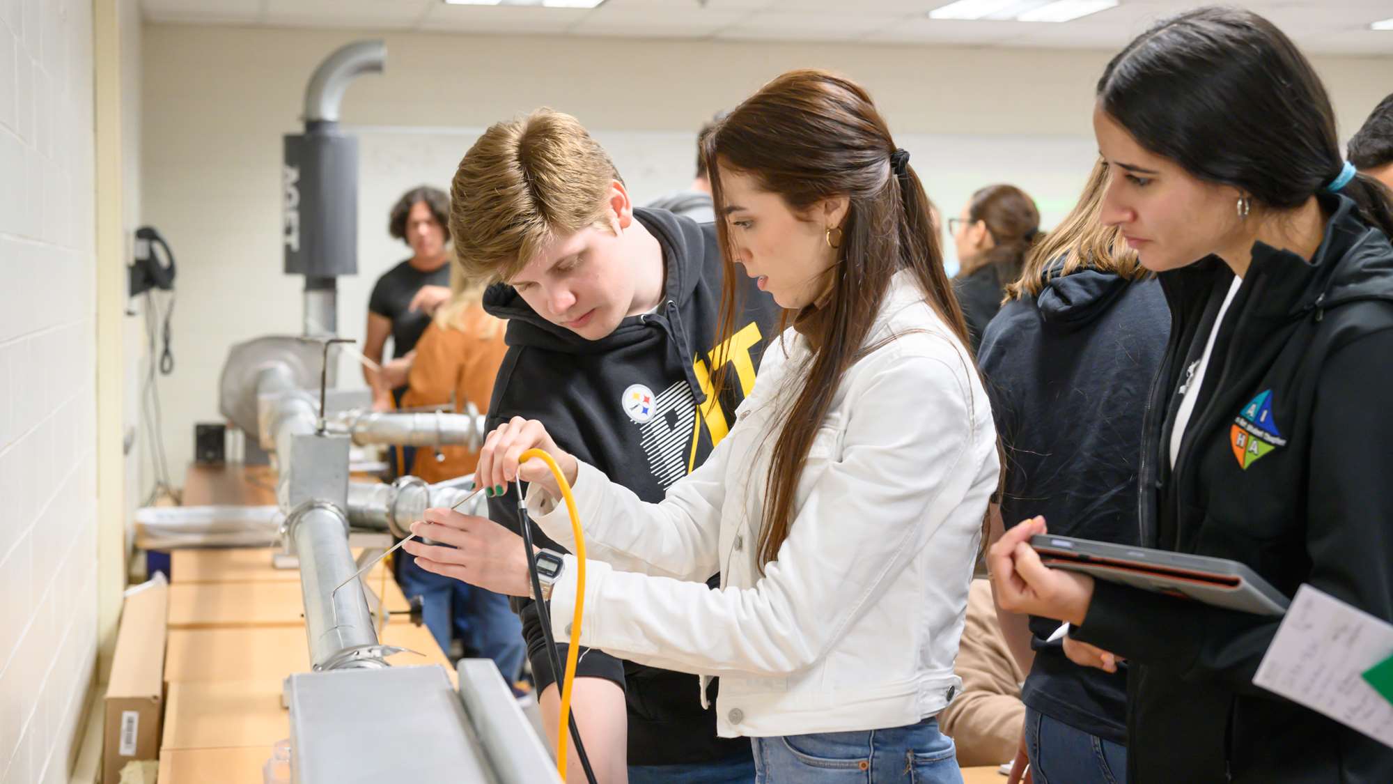 students participating in an industrial ventilation workshop 
