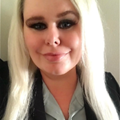 Selfie photo of professionally dressed Elizabeth Lingo.